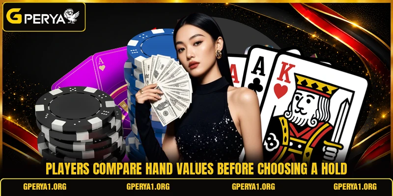 Players compare hand values before choosing a hold